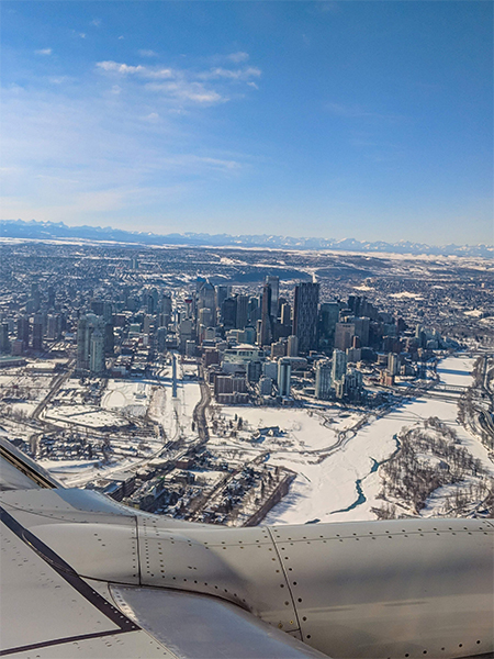 a look at Calgary from above while circling over the city in a plane.