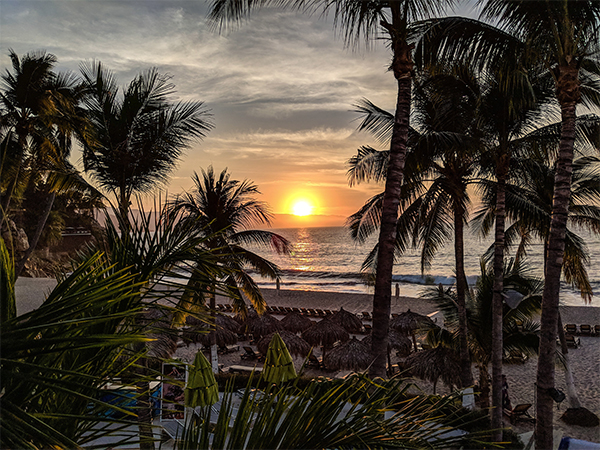 a sunrise in mexico from the beach