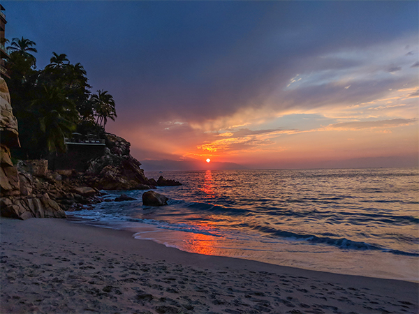 a sunset in mexico from the beach